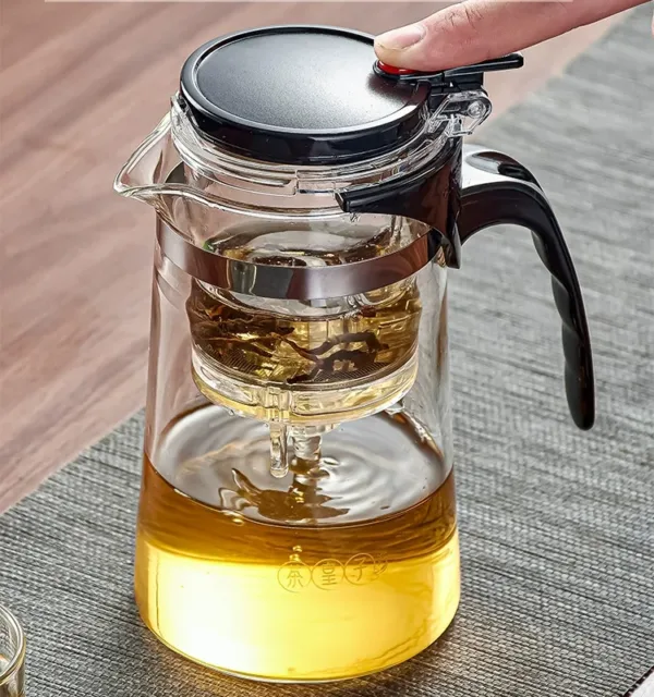 Teapot and Elegant Cup Of Tea