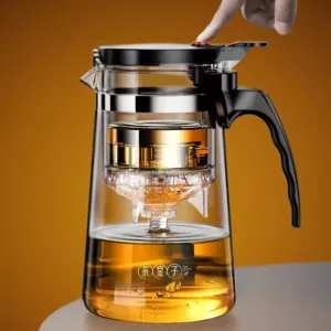 Teapot and elegant cup of tea