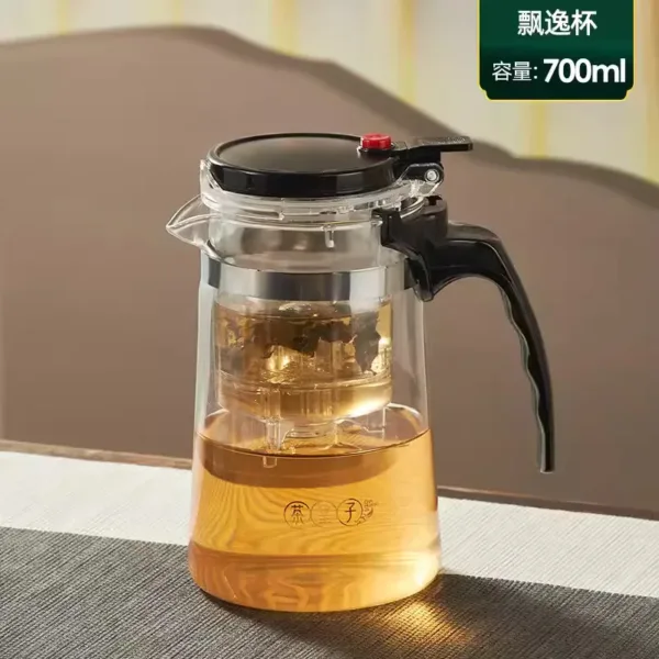 Teapot and elegant cup of tea