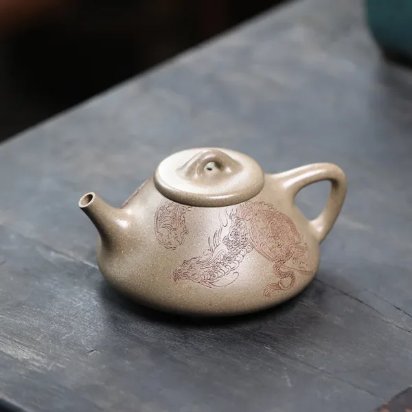 Handmade Yixing Purple Sand Ziye Shibiao Teapot Dragon Pattern(子冶石瓢壶)